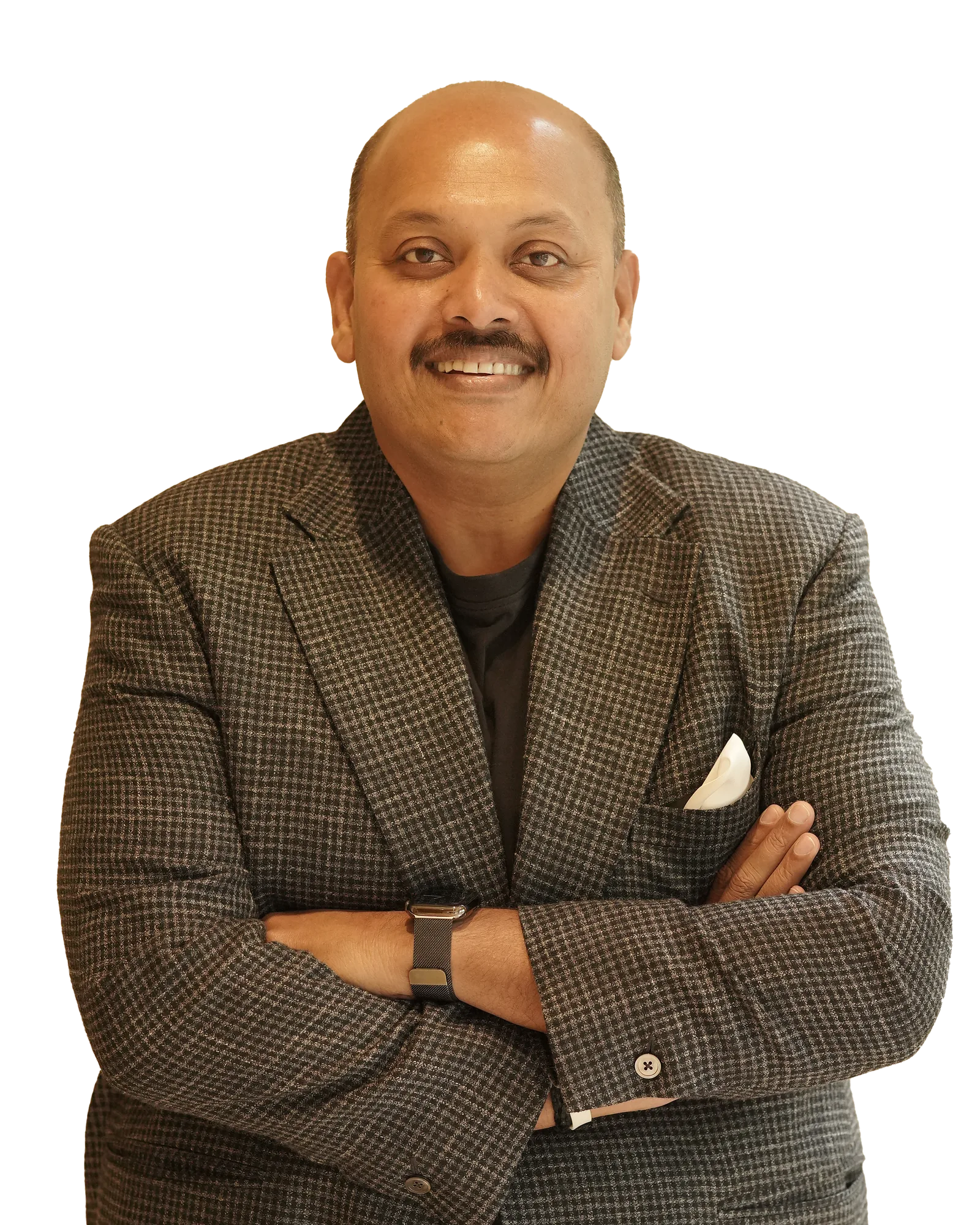 Surendran Jayasekar standing with his arms folded